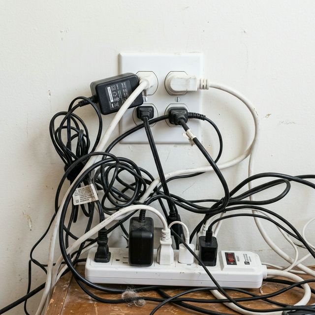 Cluttered outlet with tangled cords
